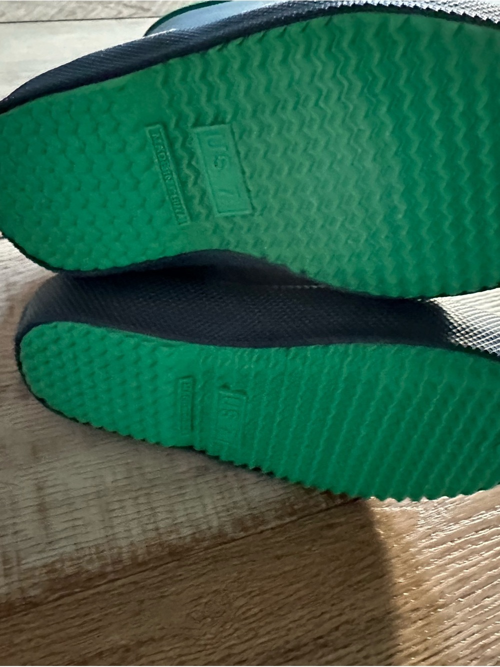 Hunter kids rain boots with Bright Green Soles